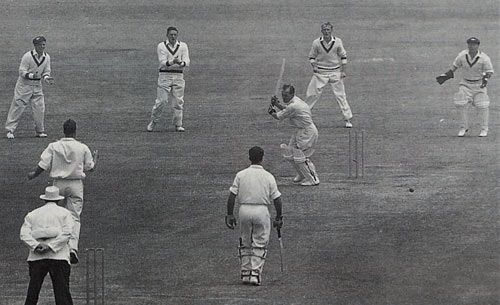 Bill Edrich plays on to Ron Archer in the second Test at Sydney
