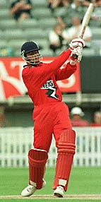 Mike Watkinson in batting action, Warwickshire v Lancashire, National League 1st Division, 13 June 1999