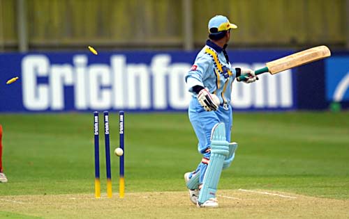 Hemlata Kala is bowled by Cheraldine Oudolf
