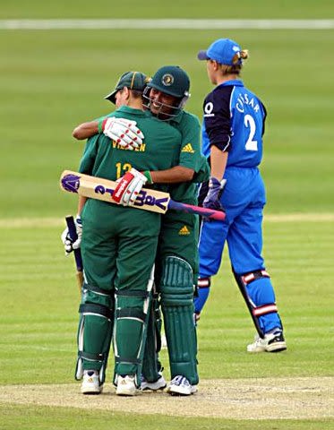 Reid hugs Viljoen as they win their Women's World Cup match against England