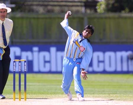 Renu Margrate bowling for India where she took 1 for 14
