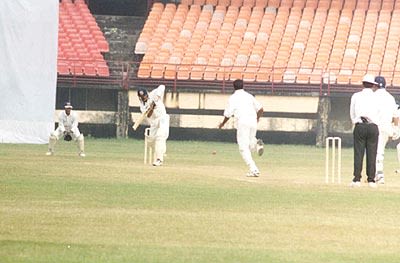 M Beerala plays the ball down from an Oasis delivery