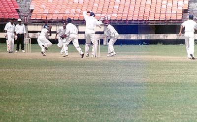 Akhil being caught at forward short leg by MP Sorab off M Suresh Kumar