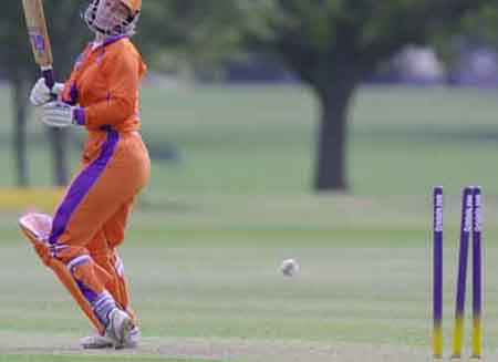 The Netherlands Caroline de Fouw looks back as the bails fly