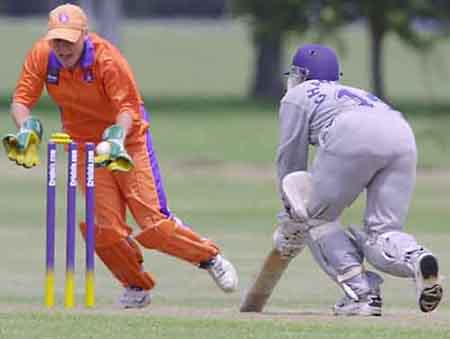 The Netherlands wicket keeper Rowan Milburn traps Sri Lanka's Champa Sugathadasa