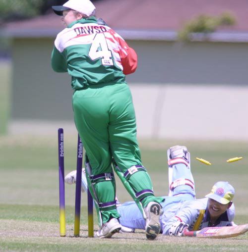 Ireland's wicketkeeper Sandra Dawson unsuccessfully appeals for the run out of India's Hemlata Kala