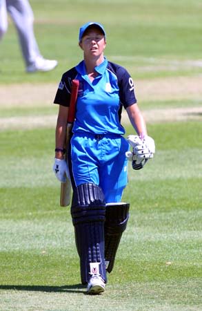 Disappointed English captain Clare Connor walks back to the pavilion after being caught behind by Thanuja Ekanayake
