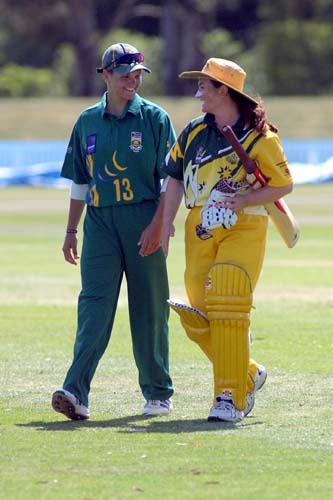 Player of the match Karen Rolton shares a joke with South African Sunnette Viljoen