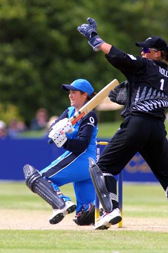 England batter Sarah Collyer plays a sweep shot