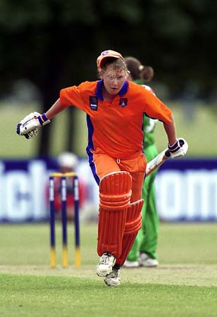 Dutch keeper Milburn dashes for a single