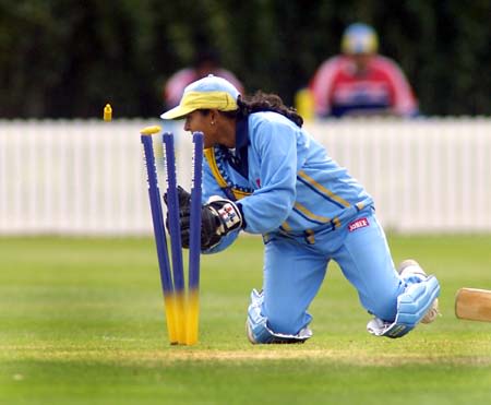 Indian wicket keeper Anju Jain completes the run out of Ramani Perera for only 4 runs