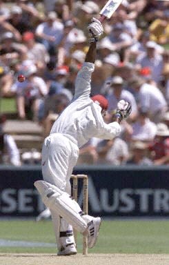 Campbell takes evasive action against a bouncer