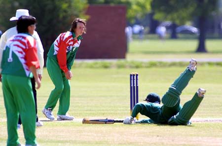 Olivier dives home safe on her way to her fine 101*