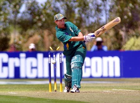 South African Anina Burger is bowled by Charmaine Mason for 14