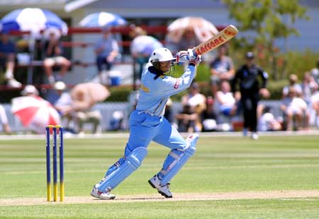 Indian opener Purnima Rau drives through square