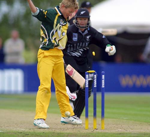 Australian bowler Charmaine Mason watches the bails fly as a direct hit from Karen Rolton runs out Catherine Campbell