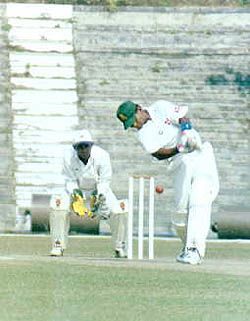 Rajesh Borah plays the ball to the off side