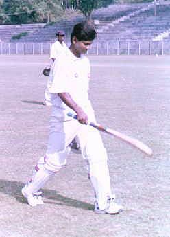 Rajesh Borah walks back to the pavilion