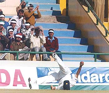 Iqbal Siddiqui takes a spectacular catch off Marcus Trescothick at fine leg