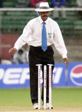 Umpire Jayaprakash calls the end of a session's play at Bangalore