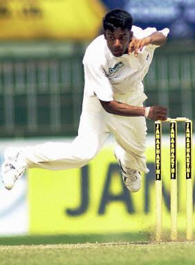 Charitha Buddhika delivers a ball