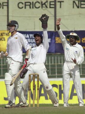 Kumar Sangakkara Mahela Jayawardene unsuccessfully appeal for Leg Before Wicket for Travis Friend