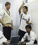 Bruce Reid telling Irfan Pathan and L Balaji about the tricks of the trade