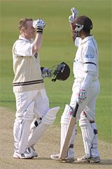 Nadeem Shahid and Ali Brown celebrate
