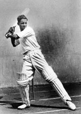 Vijay Hazare poses as he plays the cut shot