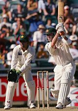 Damien Martyn drives