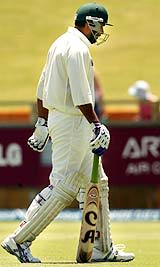 Inzamam-ul-Haq trudges back after a first-ball duck