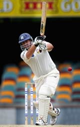 Jason Arnberger plays the cover-drive